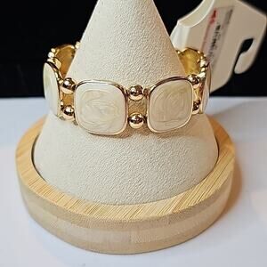 Stretch Bracelet with a swirled Cream and Gold Color, Gold Toned Beads N…